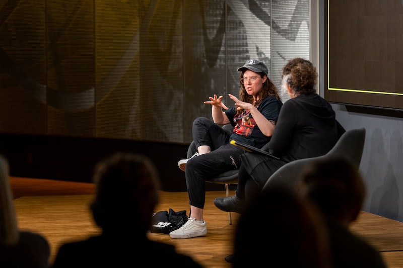 Erin Lee Carr speaks on stage at the 2022 Power of Narrative Conference.