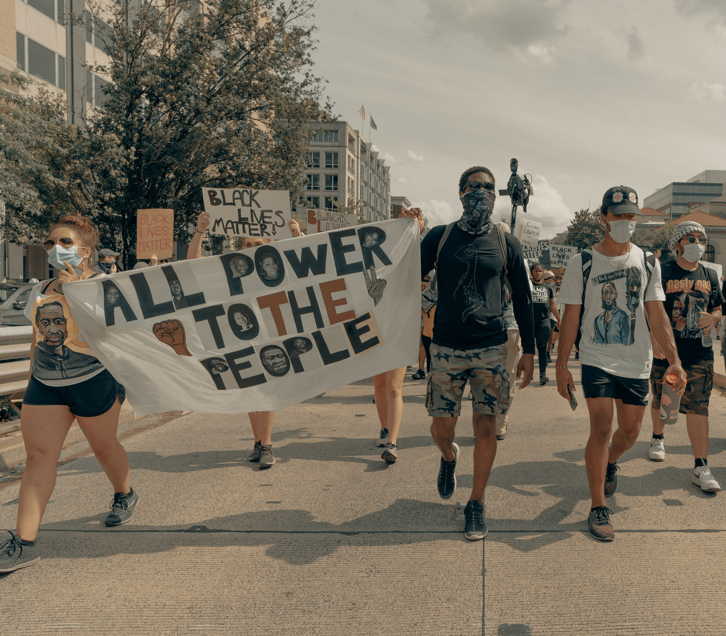 Black Lives Matter protesters holding signs