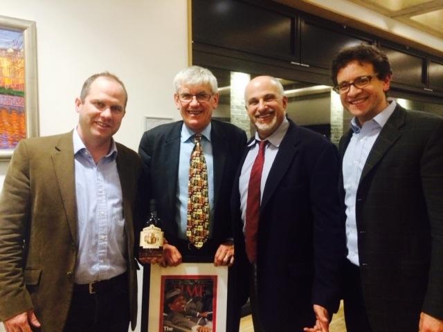 A photograph of Professors Andrew Preston, Tony Badger, Bruce Schulman, and Julian Zelizer together in a hallway.