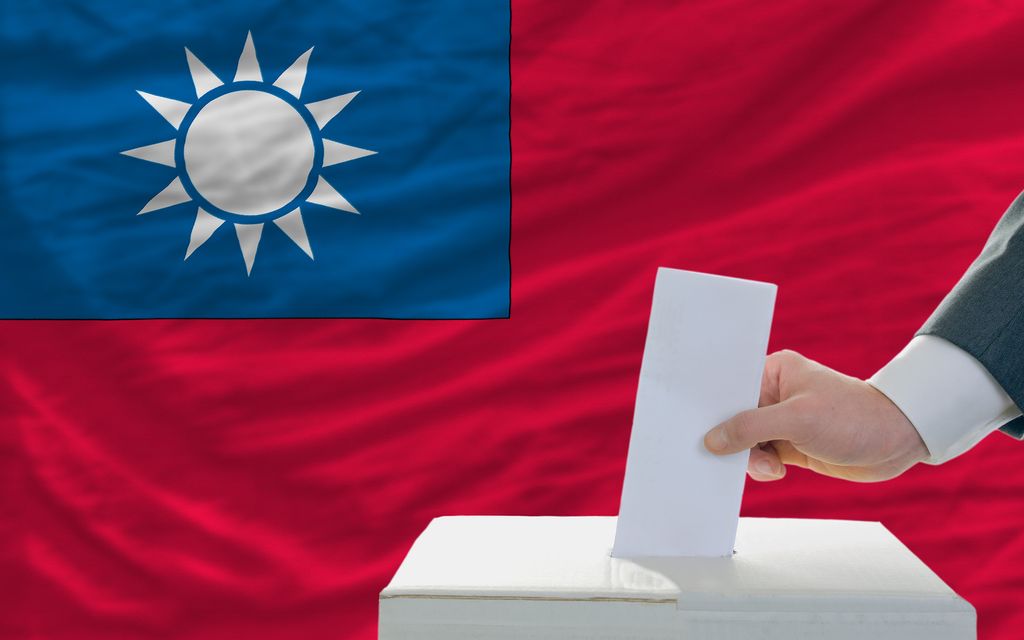 bigstock-Man-Voting-On-Elections-In-Tai-25838687