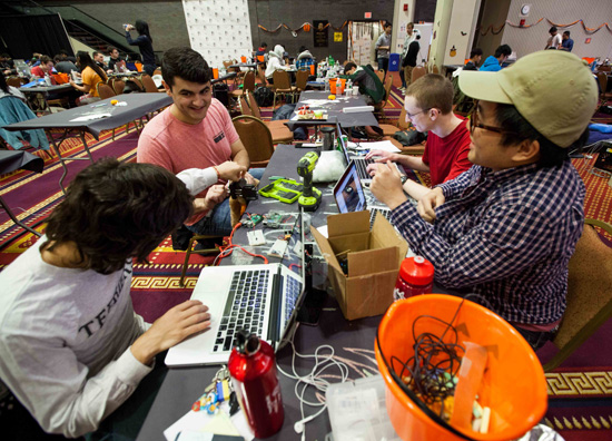 Creating a demonic teddy bear were, clockwise from upper left, Nicholas Maresco, Doug Roeper, Brian Tan, and Pablo Velarde. Photo by Kristyn Ulanday