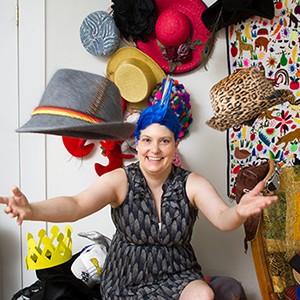 Caroline Moore-Kochlacs (GRS’16) with a small selection of the hats she has worn or plans to wear