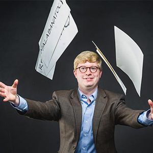Tyler Perrachione, Assistant Professor at Boston University Sargent College of Health and Rehabilitation Sciences, juggles cards with nonwords used in his dyslexic brain research