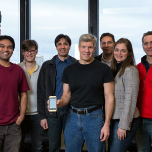 Biomedical Engineering Professor Edward Damiano in his lab with fellow researchers and their bionic pancreas