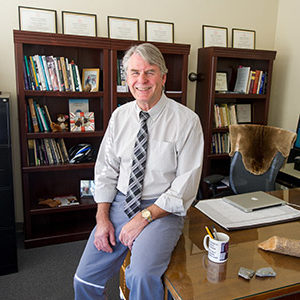 Prof. Peter Busher in his College of General Studies office.