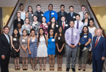 Boston Mayor Martin J. Walsh and Boston University President Robert A. Brown pose for a photo with recipients of the 2017 Thomas M. Menino Scholarship and Community Service Award