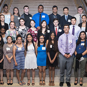 Boston Mayor Martin J. Walsh and Boston University President Robert A. Brown pose for a photo with recipients of the 2017 Thomas M. Menino Scholarship and Community Service Award