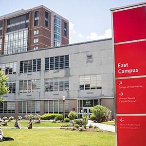Students congregate on the COM Lawn at the Boston University College of Communication, Charles River Campus