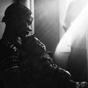 Palaver Strings violinist Maya French plays a lullaby for a baby and mother