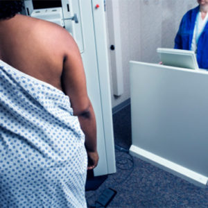 African American woman getting a mammogram