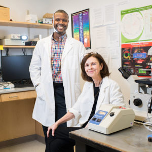 Dr. Kathy Morgan, a professor at Sargent College and Dr. Tyone Porter, pose for a photo