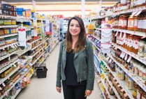 Researcher Didem Kurt poses for a photo in a grocery store