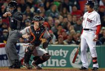 umpire C. B. Buckner and Mookie Betts