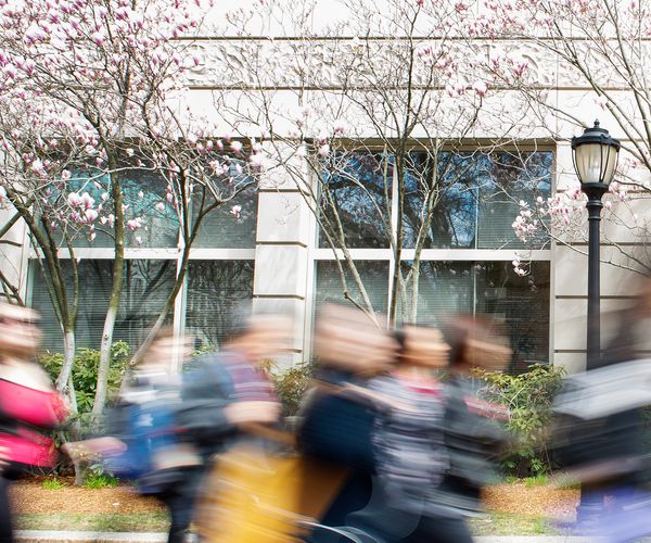 Blurred image of students walking on Commonwealth Avenue