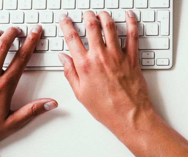 Hands on a keyboard
