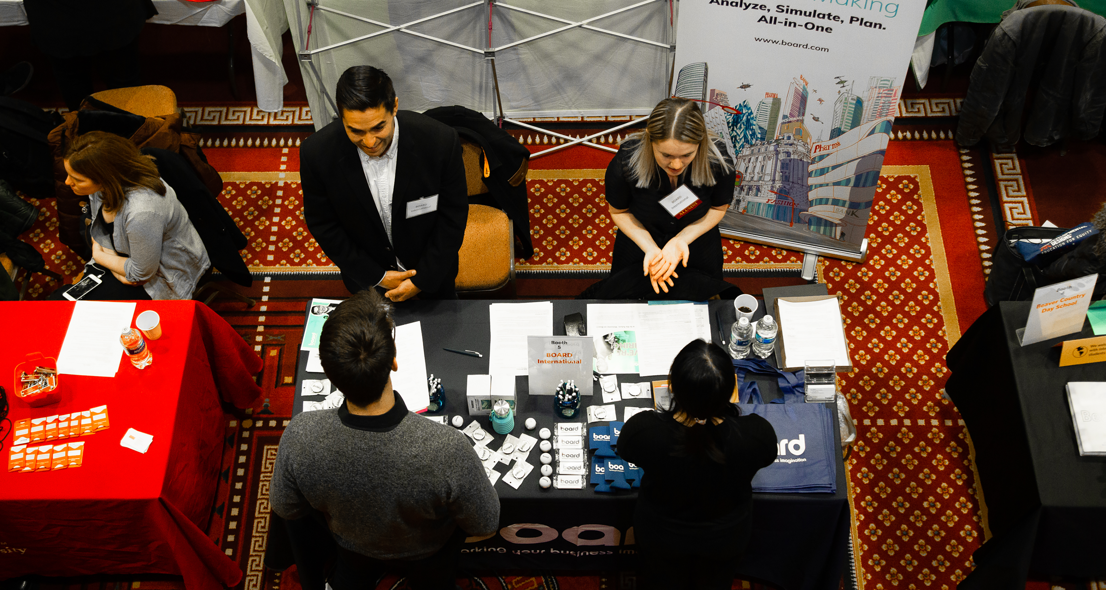 Students speaking with employers at the University-Wide Career Fair
