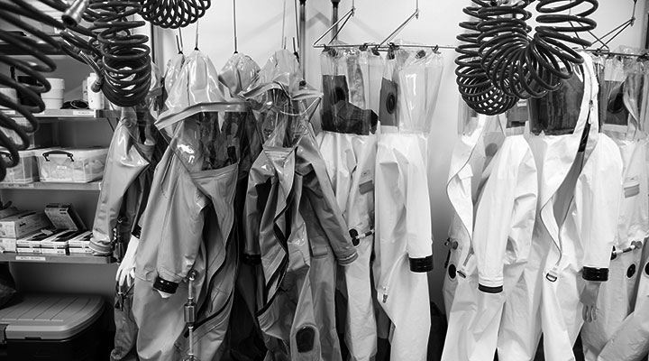 Protective suits hanging at NEIDL