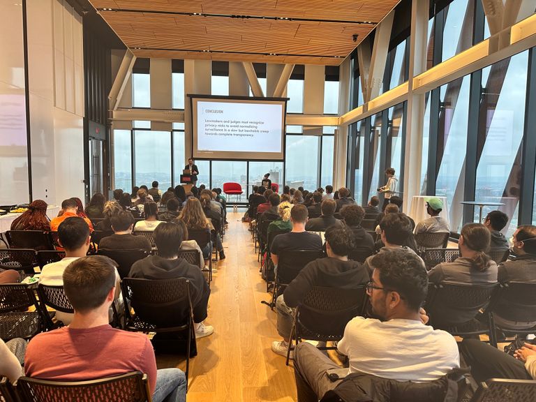 Photo of large audience group sitting on the BU Center for Computing & 数据科学 17th floor