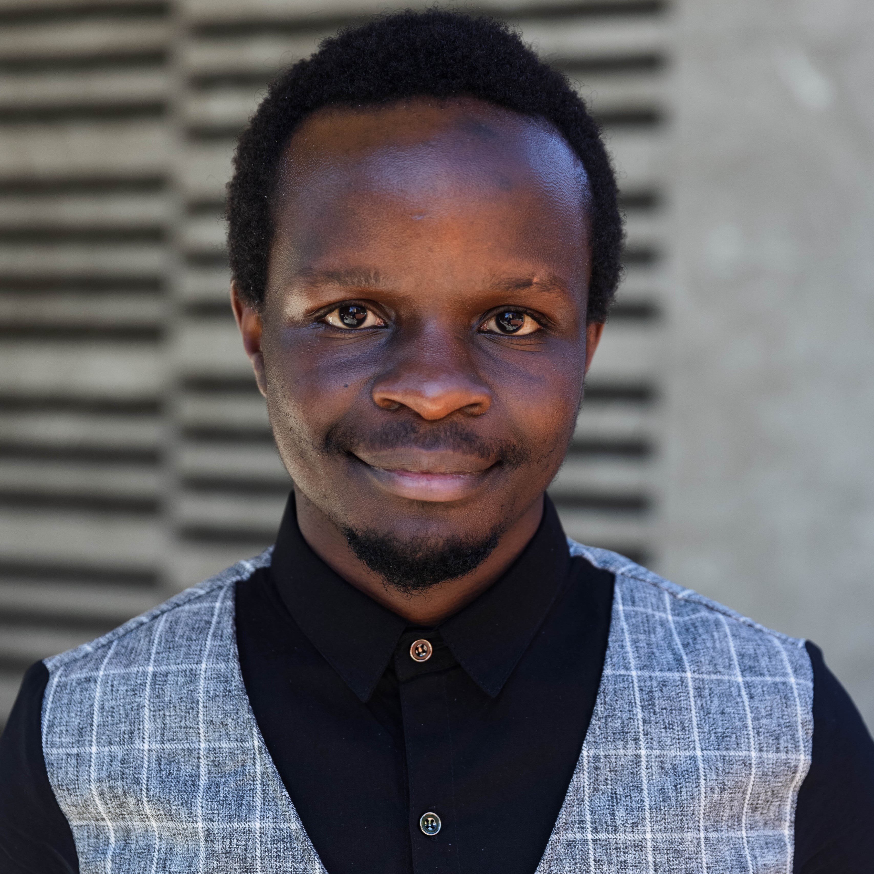 Headshot of Collins Munyendo