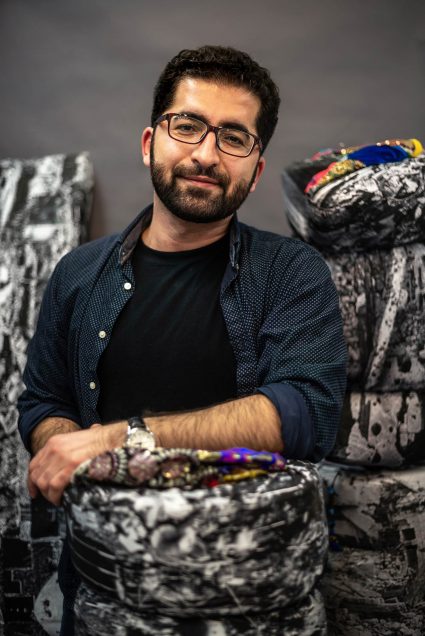 Kamal Ahmad (CFA’16), painter, sculptor, and curator of Piano Craft Gallery in Boston