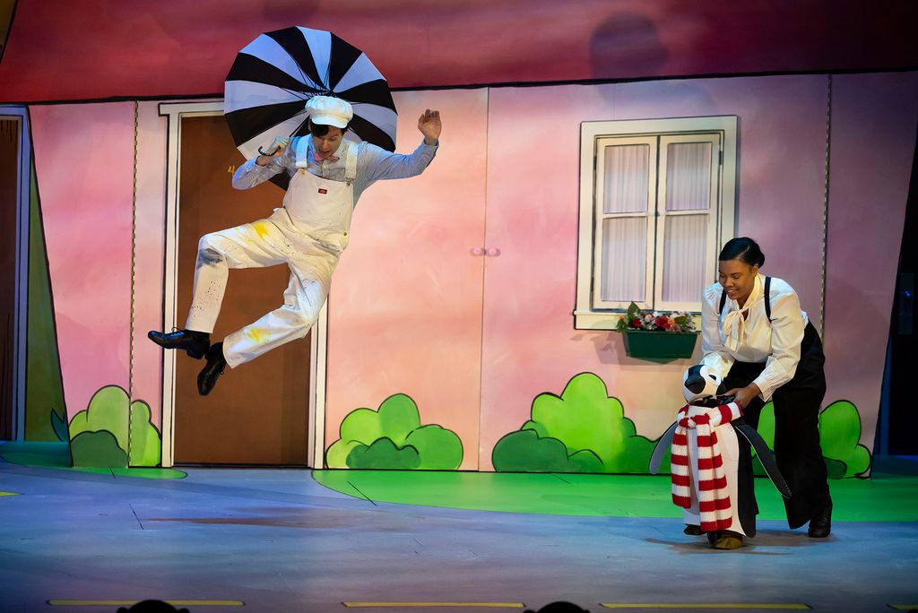 Michael Jennings Mahoney (left) as Mr. Popper is delighted when a penguin arrives as a gift from an Arctic explorer. Yasmeen Duncan (right) brings the penguin, Captain Cook, to life.