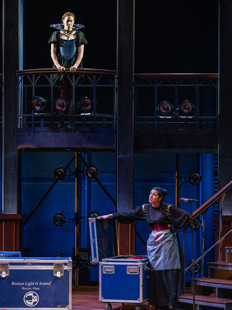 Two actors on stage in punk-inspired Elizabethan costumes