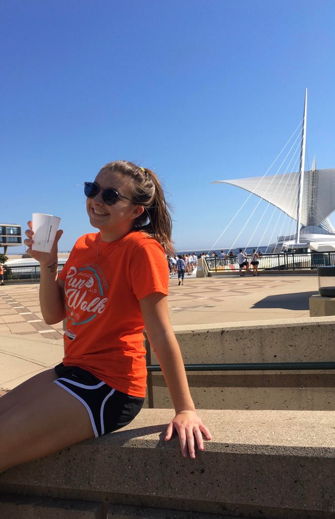 Carly Wilson wearing the t-shirt from her race