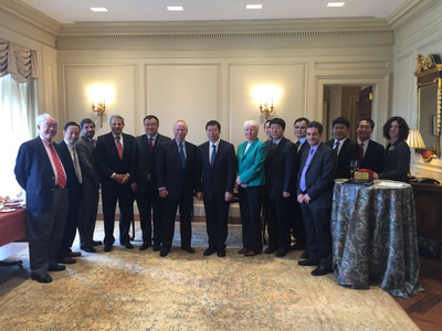 BU President Dr. Robert A. Brown and Tsinghua President Dr. Qiu Yong with representatives from the two institutions at the signing ceremony.