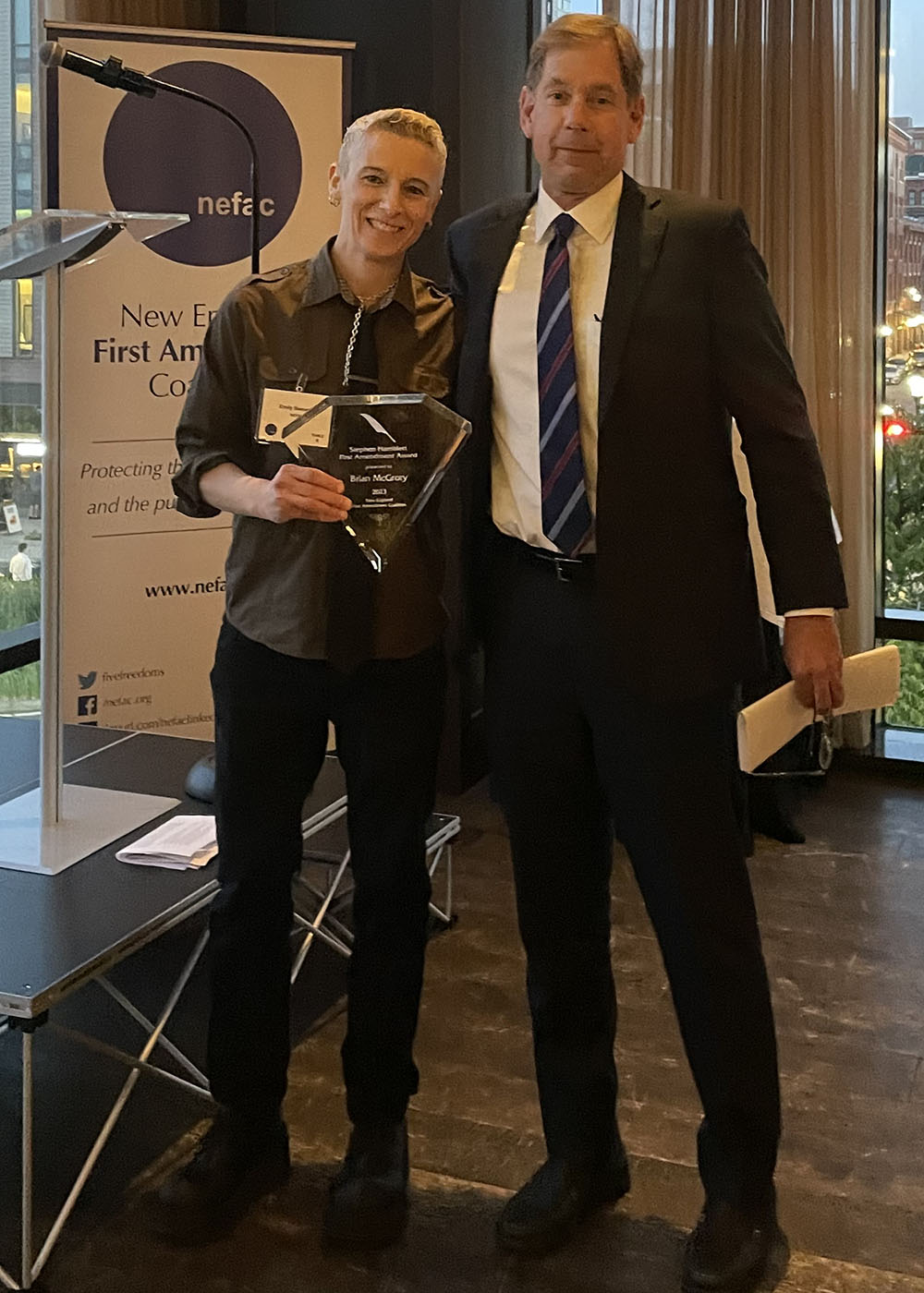 Emily Sweeney poses with COM's Brian McGrory as he accepts accepts the Stephen Hamblett First Amendment Award.