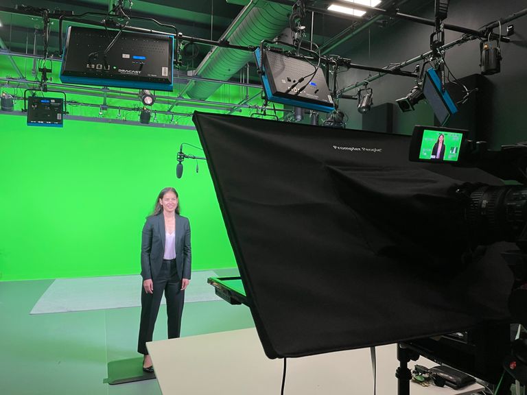 Girl in Front of Green Screen