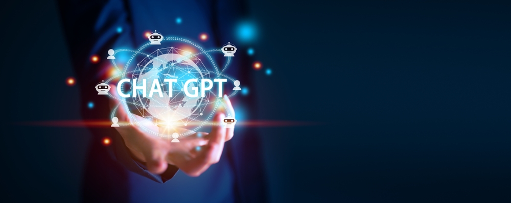 Businessman Holding Hologram ChatGPT