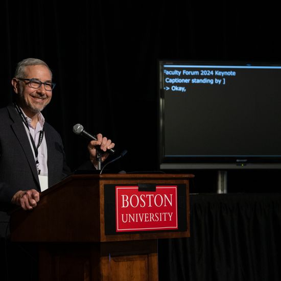 Chris Dellarocas presenting opening remarks at the Faculty Forum 2024.