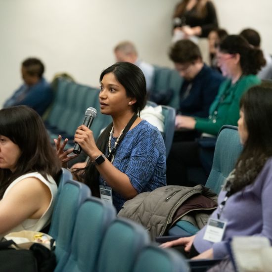 Annwesa Dasgupta is asking a question during the Q&A of the Keynote.