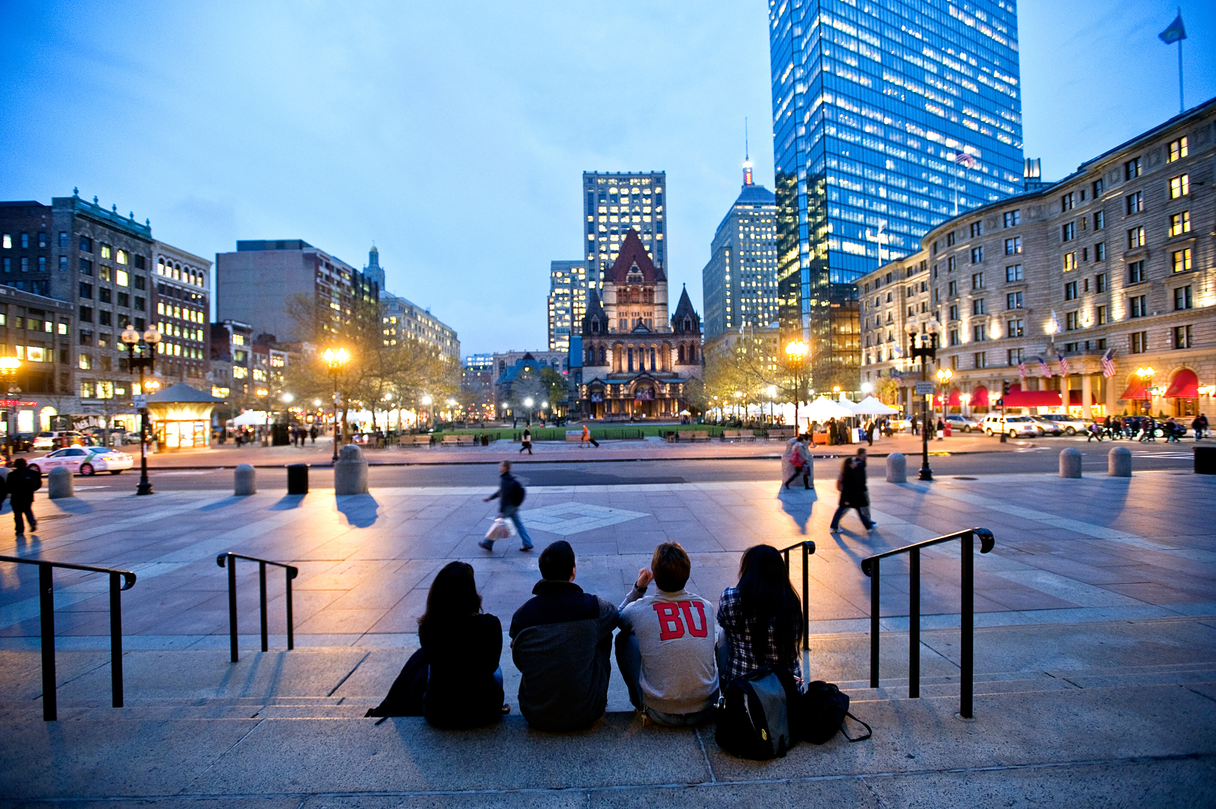 Students looking out at the hustle and bustle of Back Bay in Boston.