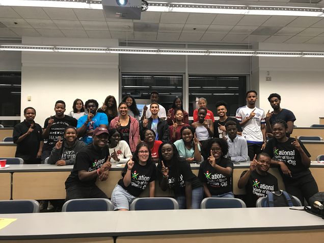 A snapshot of NSBE members at the club's bi-weekly meeting, hosted at the Photonics Center.