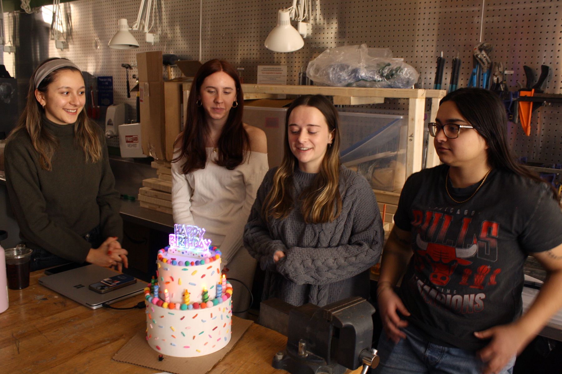 4 students who made the birthday cake project