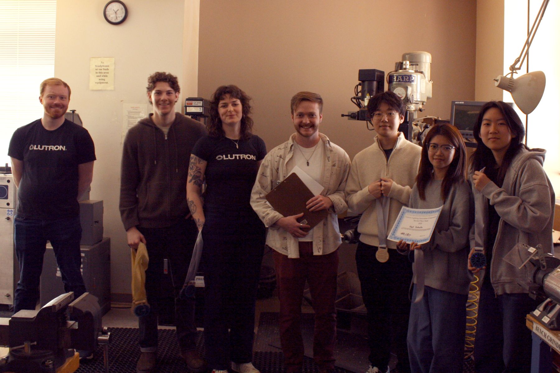 the umbrella team with the lutron judges and their 2nd place medals