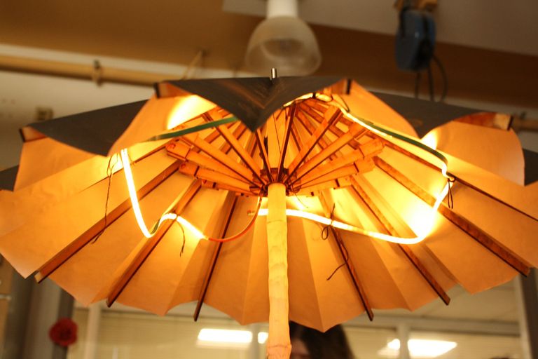 a close up shot of the inside and the draped LED strip of the umbrella project