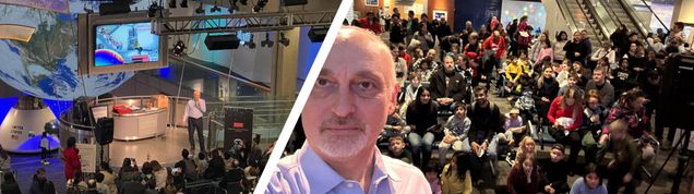 Split image. On the left, a shot of Professor 斯莱姆Unlu stand在g on the stage mid-talk, taken from the balcony above. On the right, a selfie of Professor Unlu show在g the large audience beh在d him.