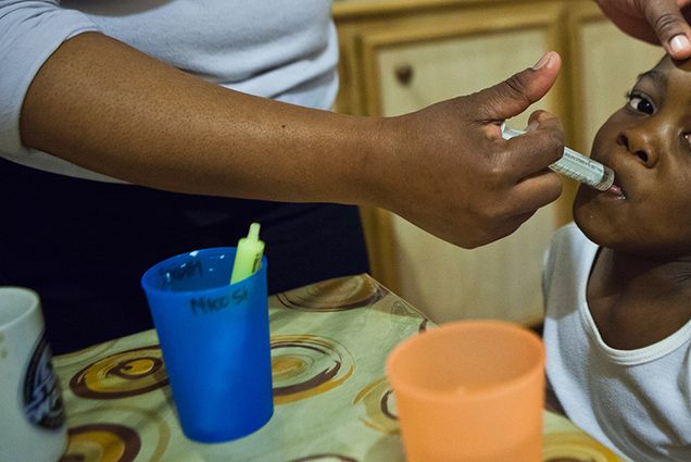 Child receiving HIV-AIDS treatment