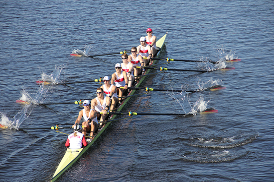 Men's rowing team at Boston University practicing on river