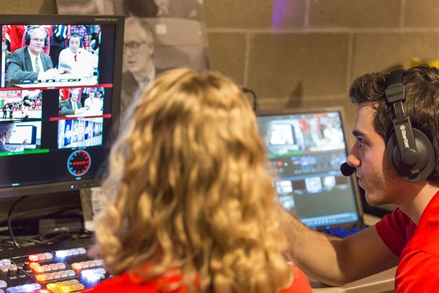Members of BUTV10 broadcast the men's basketball home opener against Northeastern at Case Gym. Director Justin Akiva (COM '18) works with technical director Caroline Rickert (COM '18) to make sure to catch all of the action for viewers at home. 