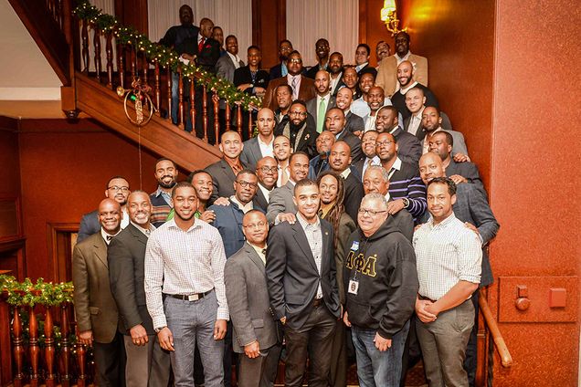 The men of Alpha Phi gather for a group photo at The Algonquin Club December 4, 2015 where the fraternity was hosting a panel discussion about careers in the fields of politics, technology, business, entertainment to current college students. Boston University chapter of Alpha Phi Alpha Fraternity celebrated it's 100th anniversary this past weekend with the panel discussion, receptions, and a banquet gala. Dr Martin Luther King was an initiate of the chapter in 1952 as well as other prominent African-American men over the past 100 years. Photo by Olivier Kpognon