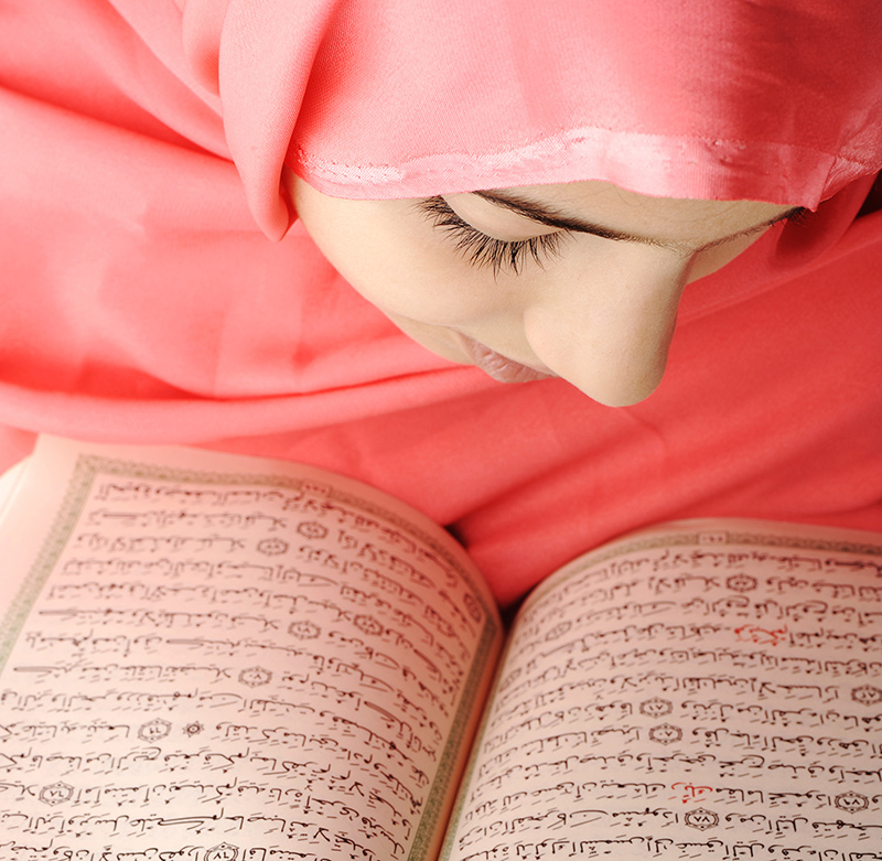 student studying islamic text