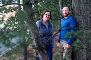 Photo of Lucy Hutyra and Andrew Reinmann in the forest