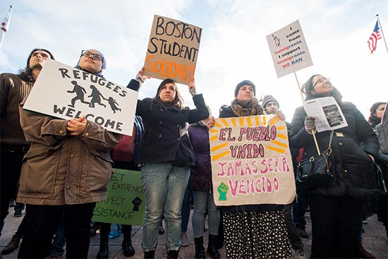 Students at Boston University participate in a rally protesting Donald Trump's Executive Order Immigration and Refugee Ban