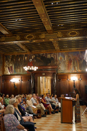 Lisa Rosinsky reading from podium to room
