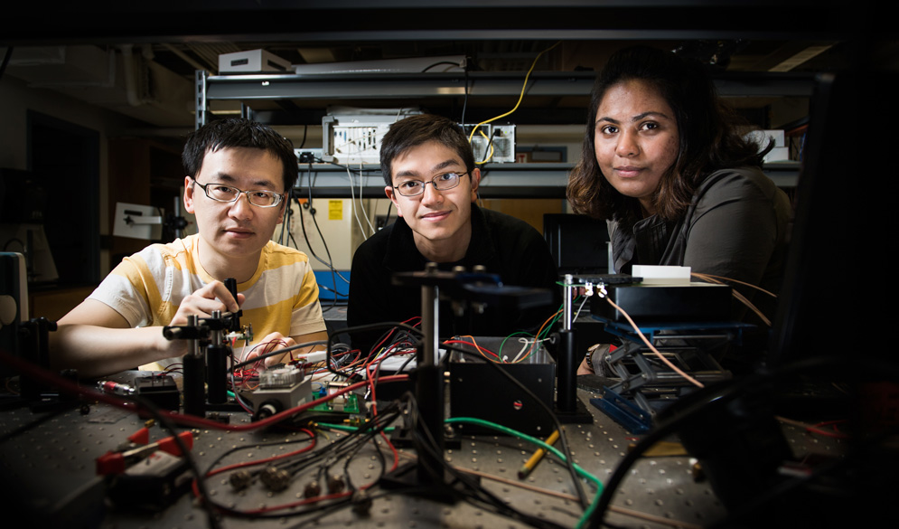Graduate students in the Boston University BOTLab, Fei Teng (ENG’18), Kavon Karrobi (ENG’19), and Syeda Tabassum (ENG’18)