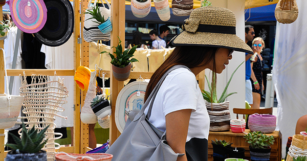 Young woman perusing Sowa Open Market