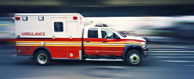 Ambulance speeding through a tunnel